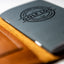 Close-up of the golf log in the leather cover