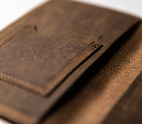 The inside front cover showing the business card holder