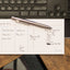 Filled out weekly planner sheet with Monday through Friday columns and notes section